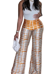 Person wearing a white top and orange checkered pants on a white background