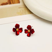 Buttercup flower stud earrings covered in 18k gold