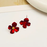 Buttercup flower stud earrings covered in 18k gold