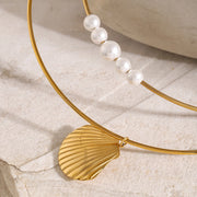 Choker style necklace with shell or pearls