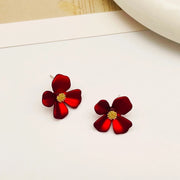 Buttercup flower stud earrings covered in 18k gold