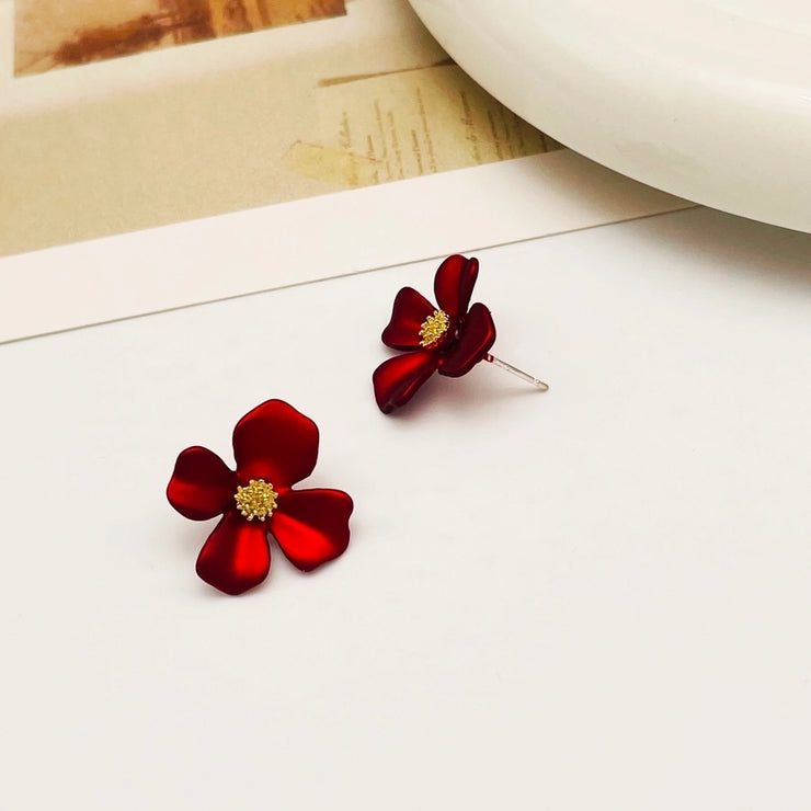 Buttercup flower stud earrings covered in 18k gold